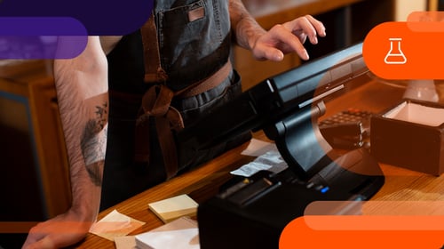 man working at cash register