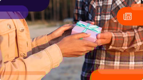 person giving gift to someone else