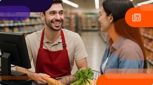 Cashier talking to customer about loyalty program