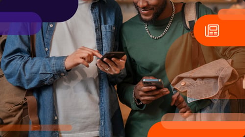 two friends looking at their phones 
