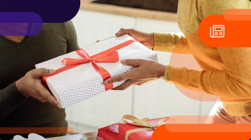Someone giving another person a gift