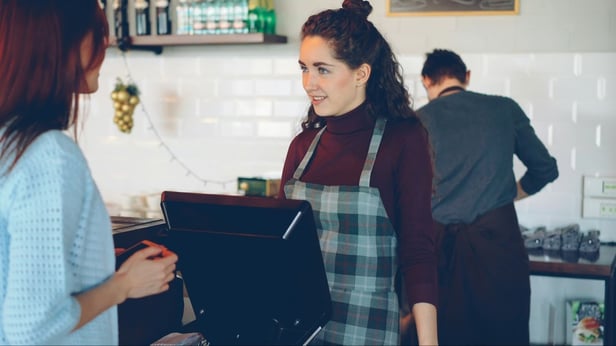 Customer at Checkout Counter