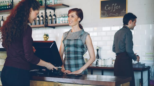 Customer checking out at Cafe