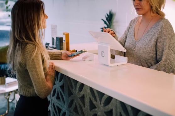 Retail Customer at Checkout Counter