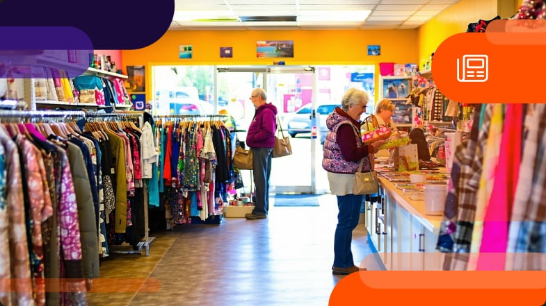 People browsing a thrift store to use loyalty program promotions 